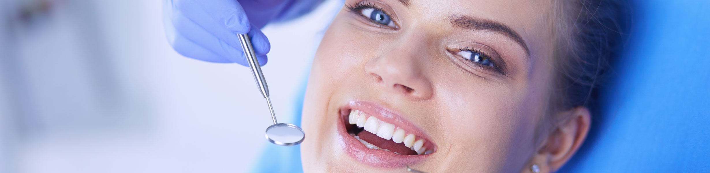 Woman smiling at the dental